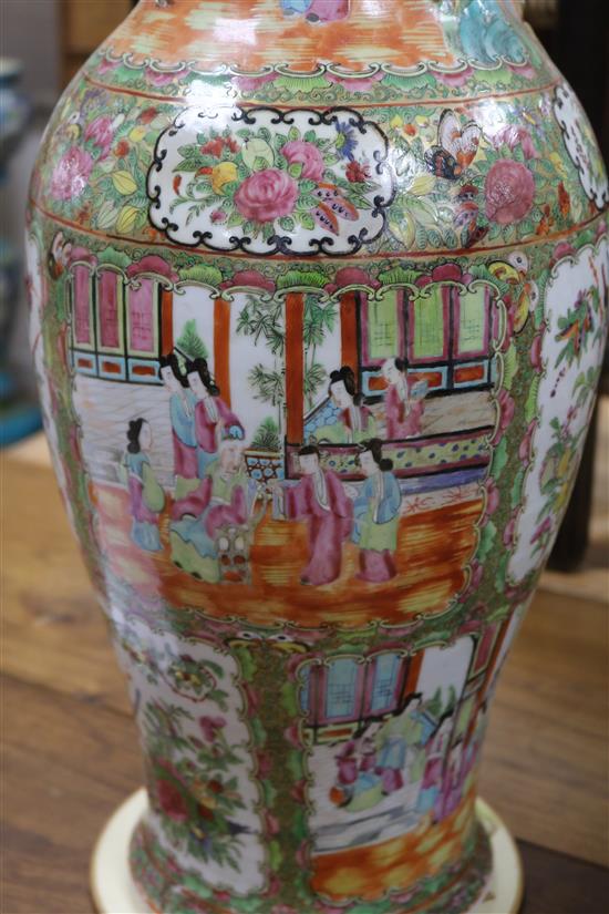 A pair of large 19th century Chinese famille rose vases and cover, 67.5cm high, repaired